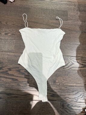 naked wardrobe White Spaghetti Strap One-Piece Bodysuit